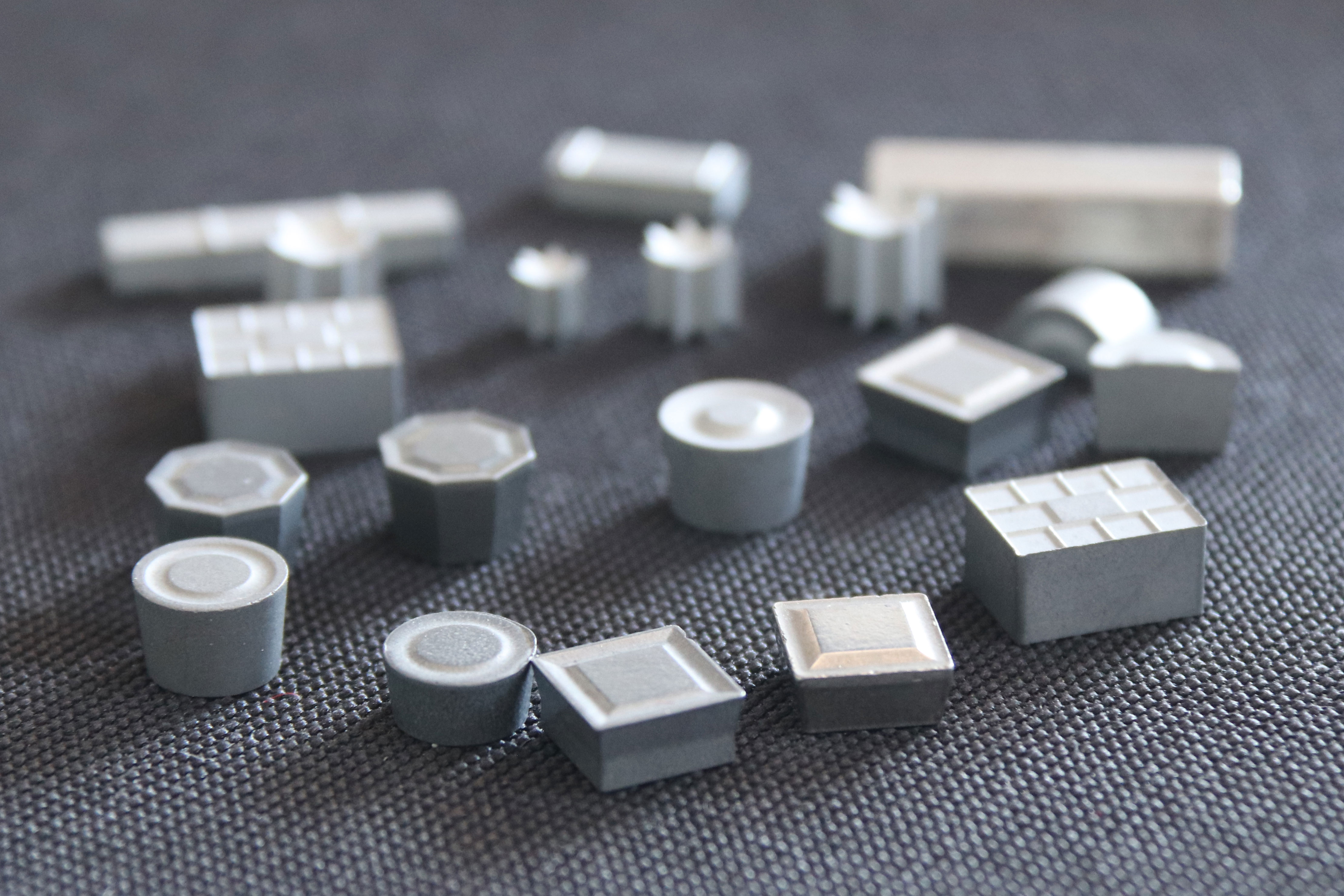 Tungsten Carbide Wear Inserts for Downhole Tool Dressing